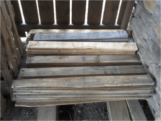 A stack of raw pallet boards.