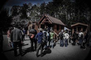 People lined up to tour the tiny houses